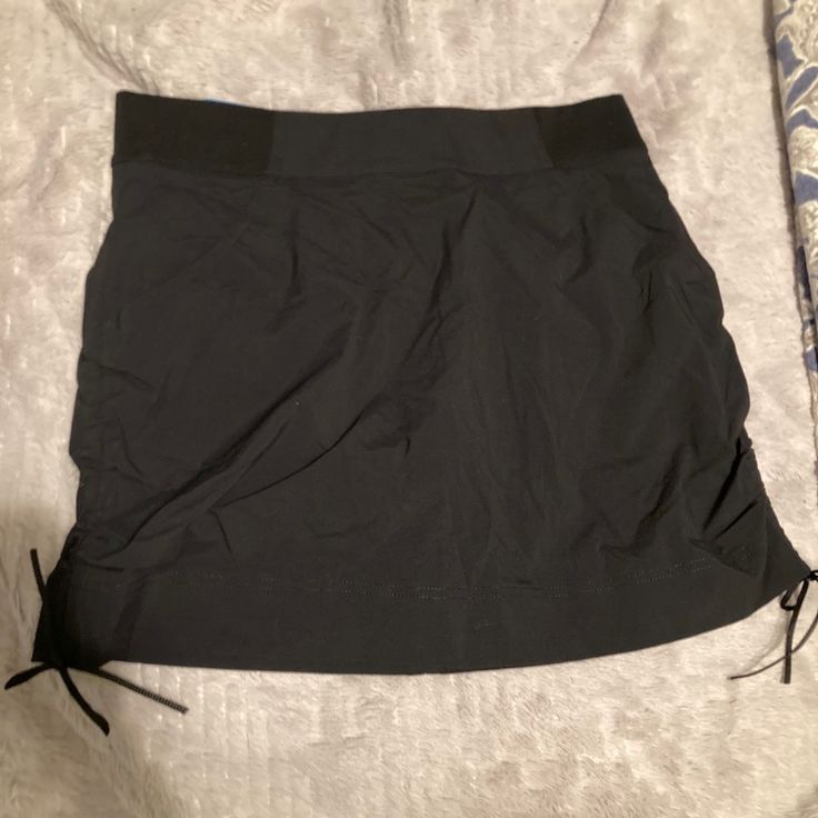 Great Black Columbia Skirt/Skort. Brand New With Tags. Black Nylon Lined Skirt, Casual Black Mini Skirt With Built-in Shorts, Black Nylon Skirt, Casual Black Skirt With Built-in Shorts, Casual Black Shorts With Lined Skirt, Casual Black Stretch Swim Skirt, Black Skort With Built-in Shorts For Spring, Spring Black Skort With Built-in Shorts, Casual Black Swim Skirt