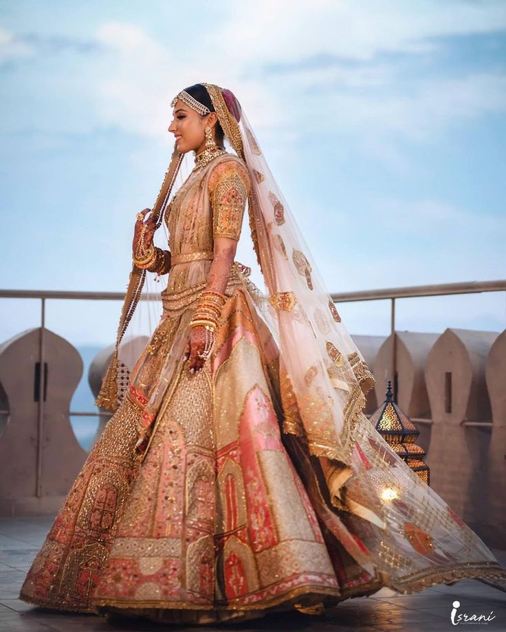 a woman in a bridal gown and veil