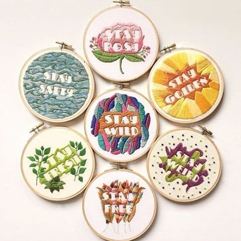 six embroidered hoops with different designs on them, each featuring the word stay wild