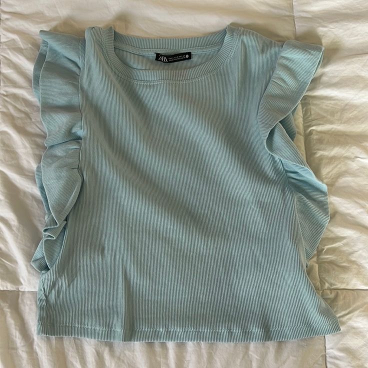 Never Worn, New Condition. Light Baby Blue Color. Simply Gorgeous. Trendy Light Blue Ruffled Top, Trendy Blue Ruffled Tops, Trendy Blue Tops With Ruffles, Zara Light Blue Ruffled Tops, Light Blue Ruffled Top By Zara, Light Blue Ruffled Zara Top, Zara Ruffle Top, Baby Blue Color, Baby Blue Colour