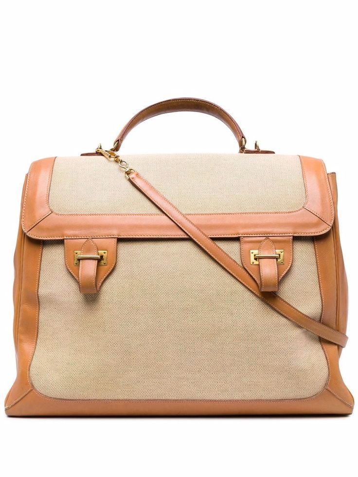 Cream beige/camel-coloured canvas/leather 1948 pre-owned large flap two-way bag from Hermès Pre-Owned featuring foldover top, double buckle fastening, single rounded top handle, detachable shoulder strap, internal patch pockets, full lining, gold-tone hardware, rectangle body and circa 1948. POSITIVELY CONSCIOUS: Purchasing this item continues its narrative and reduces the environmental impact of using new resources. You can be confident that you’re making a better choice for the Planet.. Timeless Beige Satchel For Travel, Timeless Beige Travel Satchel, Beige Satchel With Hasp Closure And Tote Shape, Beige Top Handle Satchel With Hasp Closure, Designer Travel Satchel With Hasp Closure, Timeless Beige Double Handle Satchel, Classic Beige Briefcase With Double Handle, Classic Beige Satchel With Detachable Handle, Beige Travel Satchel With Turn-lock Closure