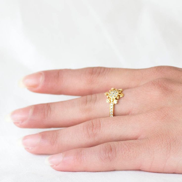 Fairy tale like Snowflake ring. Wax carved then cast in Solid Gold Shown here in 14K Yellow Gold and set with Diamonds. These VS Quality Diamonds sparkle intensely and gleam on your finger. The beauty of this ring is in the Symmetry and delicate hand workings around each stone. The contrast between the Gold and the Diamonds is remarkable is allows the stones to light up. This ring could stack wonderfully with your other Ardonn Rings or other rings here from different sellers here on etsy!. ► Han Gold Snowflake Jewelry For Wedding, Gold Filigree Ring With Prong Setting As Gift, Snowflake Ring, Wax Carving, Etsy Gold Ring, Quality Diamonds, Stackable Rings, Eternity Ring, Fairy Tale