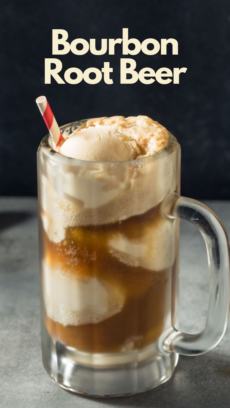 bourbon root beer in a glass mug with ice and cinnamon on the rim, garnished with a striped straw