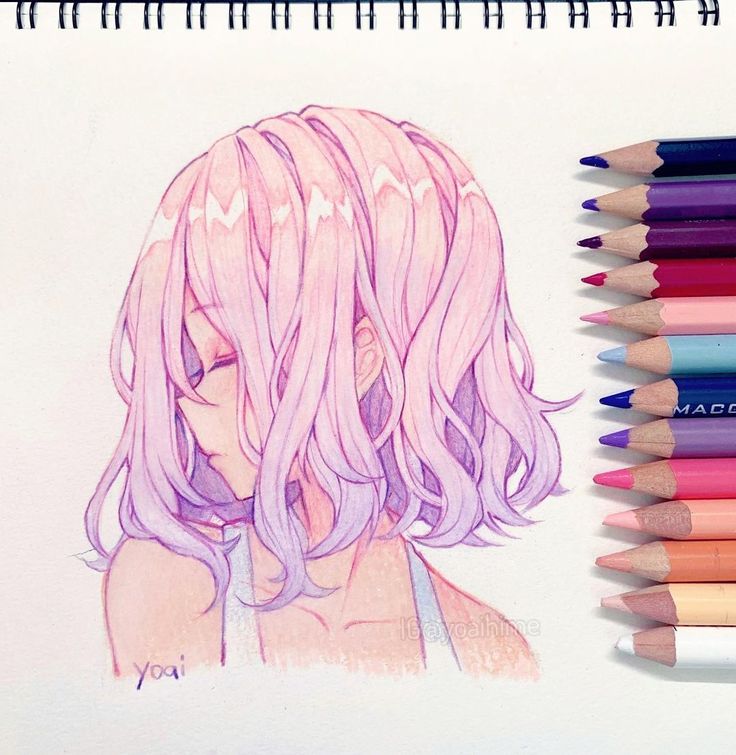 a drawing of a girl with pink hair and colored pencils in front of her