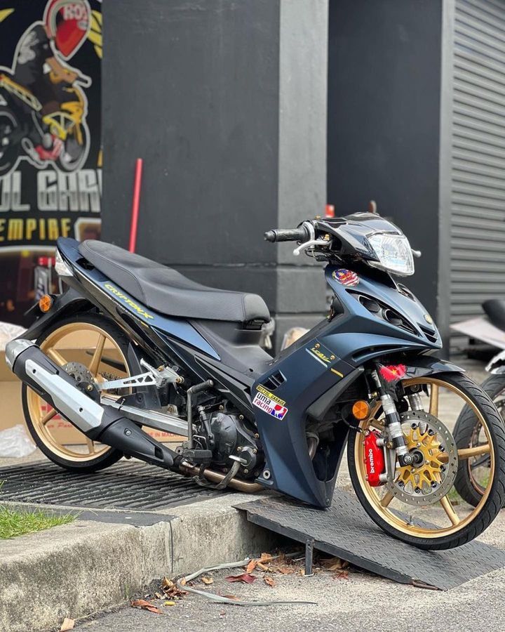 a motorcycle parked on the side of a road