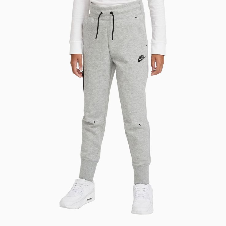 Nike Sportswear Tech FleeceBig Kids' (Girls') PantsLIGHTWEIGHT WARMTH.Make the most of chilly days by pulling on the Nike Sportswear Tech Fleece Pants. More than your regular sweats, it’s all about premium fleece fabric. Warm? Check. Soft? Check. No bulk? Double check. And don’t forget the zippered pocket down the side.Nike Tech Fleece provides the ultimate in lightweight warmth.Signature Tech Fleece details highlight pockets and leg zipper.Elastic waistband with drawcord provides a secure fit.A Nike Sportswear Tech Fleece, Kids Sportswear, Boys Joggers, Girls Joggers, Nike Sweatpants, Nike Boy, Nike Tech Fleece, Satin Jackets, Training Pants