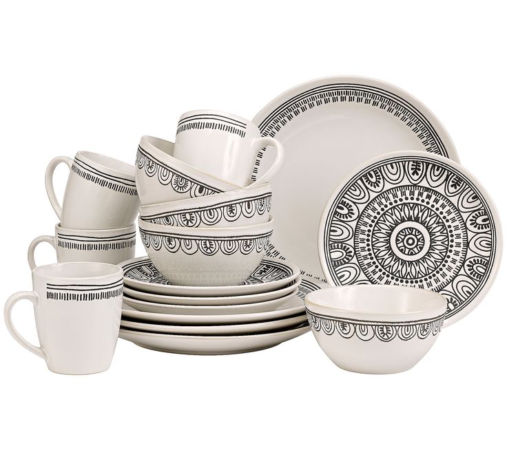 an assortment of white and black dinnerware