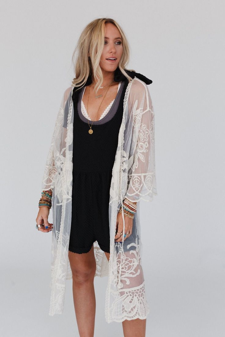 With its intricate design and comfortable fit, the Butterfly Beach Kimono is the perfect addition to any boho wardrobe! Whether you're dressing up or down, this kimono is the perfect finishing touch to any boho look because it features: See-through design crafted from delicate embroidered lace Flowy and lightweight, perfect for warm weather or layering Versatile front tie closure for a customizable fit and added style Intricate butterfly-inspired details for a charming and boho look Your favorit Bohemian Lace Beach Cover-up, Bohemian Sheer V-neck Cover-up, Lace Open Front Cover-up For Summer, Bohemian Kimono With Floral Embroidery For Beach, White Hippie Kimono For Spring, Bohemian Sheer Cover-up For Summer, White V-neck Kimono For Festival, White Lace Cover-up For Spring, White Hippie Cover-up For Spring