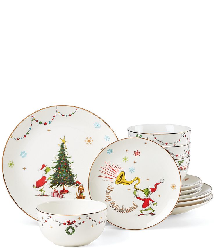 a set of christmas dinnerware with an image of a tree on the front and side