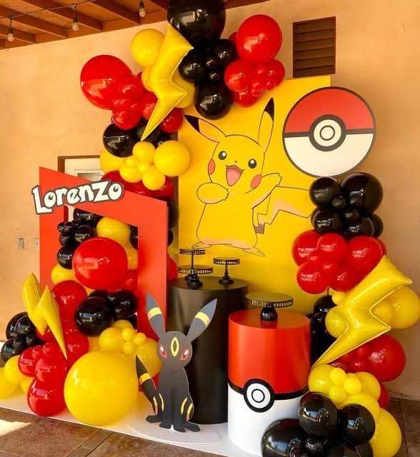 balloons are arranged in the shape of pokemons and pikachu's on display