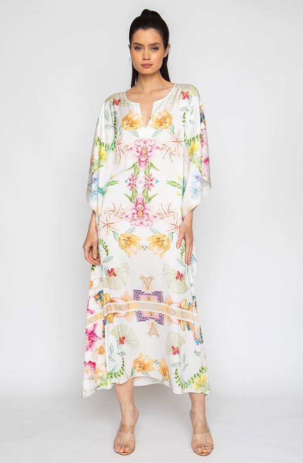 Bring out your inner flower in the Botanica Long Caftan. This gorgeous piece of apparel features delicate flowering patterns, giving you the freedom to show off your unique style. And the airy fabric won’t weigh you down, meaning you can wear your beauty around the clock! Bloom into something special with the Botanica Long Caftan. Printed short caftan Can be worn loose or cinched at the waist Comes with a matching belt as an option for styling Lusciously soft poly-silk blend for ease of care Mac White V-neck Floral Print Kaftan, V-neck Floral Print Tunic For Beach Cover-up, Elegant Floral Print Tunic Kaftan, Elegant Floral Embroidered Kaftan For Spring, Silk Kaftan With Floral Print And V-neck, Silk Floral Print Kaftan For Beach Cover-up, Spring Silk Kaftan With Floral Embroidery, Elegant Spring Kaftan With Floral Embroidery, Silk Kaftan With Floral Embroidery For Spring