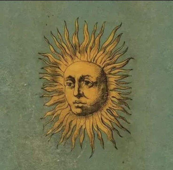 a drawing of a sun with the face of a man's head on it