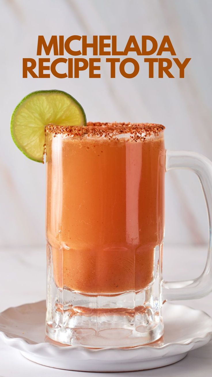 a mug with a lime slice on top and the words michelada recipe to try