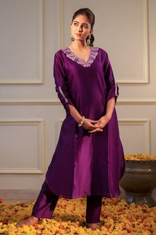 Purple A-line kurta featuring floral hand embroidery around the neckline with gathered sleeve and side pocket. Paired with a straight pant. - Aza Fashions Fitted Straight Kurta Set With Embroidered Neckline, Eid Festival Fitted Set With Embroidered Neckline, Fitted Sets With Embroidered Neckline For Eid, Wedding Sets With Embroidered V-neckline, Elegant Festive Traditional Wear With Embroidered Neckline, Bollywood Style V-neck Kurta With Embroidered Neckline, Festive Traditional Wear With Embroidered Neckline, Elegant Silk Sets With Embroidered Neckline, Elegant Wedding Traditional Wear With Embroidered Neckline