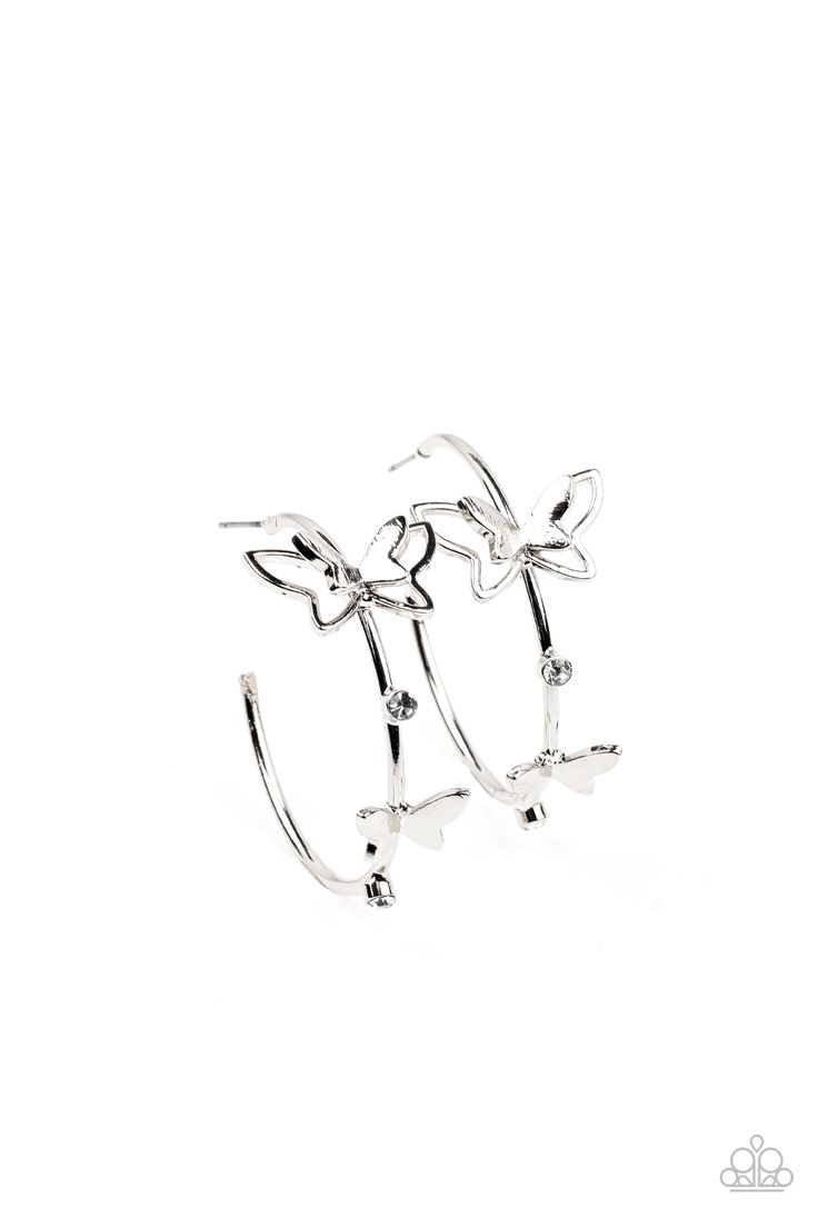 A pair of dainty silver butterflies flutter atop a glistening silver hoop dotted with dainty white rhinestones, creating a whimsical sight. Earring attaches to a standard post fitting. Hoop measures approximately 1 1/2" in diameter.

 Sold as one pair of hoop earrings. Silver Butterflies, White Hoop Earrings, Silver Butterfly Earrings, White Butterfly, Paparazzi Accessories, White Rhinestone, Affordable Jewelry, White Earrings, Paparazzi Jewelry