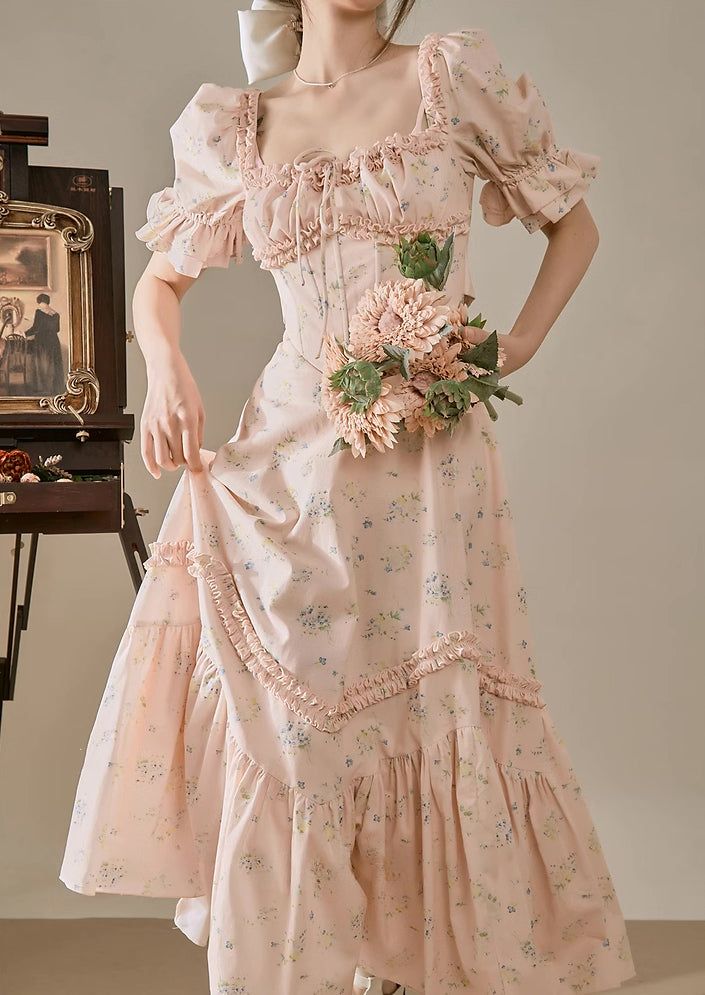 Feel like a princess in this sweet ditsy floral dress with a square neckline, short puff sleeves, ruffle details, basque waistline and mermaid flared midaxi skirt. Waist is enforced with fishbone boning and cinches with a self-tie waist strap. Concealed back zipper. S: 31.5" chest, 26" waist, 48" lengthM: 33" chest, 27.5" waist, 48" lengthL: 34.5" chest, 29" waist, 48" length Princess Outfits Casual, House Wife Dress, Princess Core Outfit, Wife Dress, Cultural Clothes, Housewife Dress, Floral Dress Pink, Midaxi Skirt, Princess Fashion