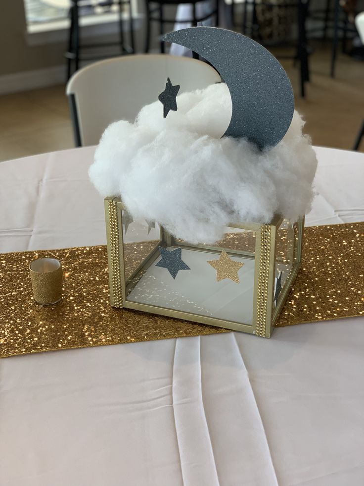 there is a cloud in a box on the table