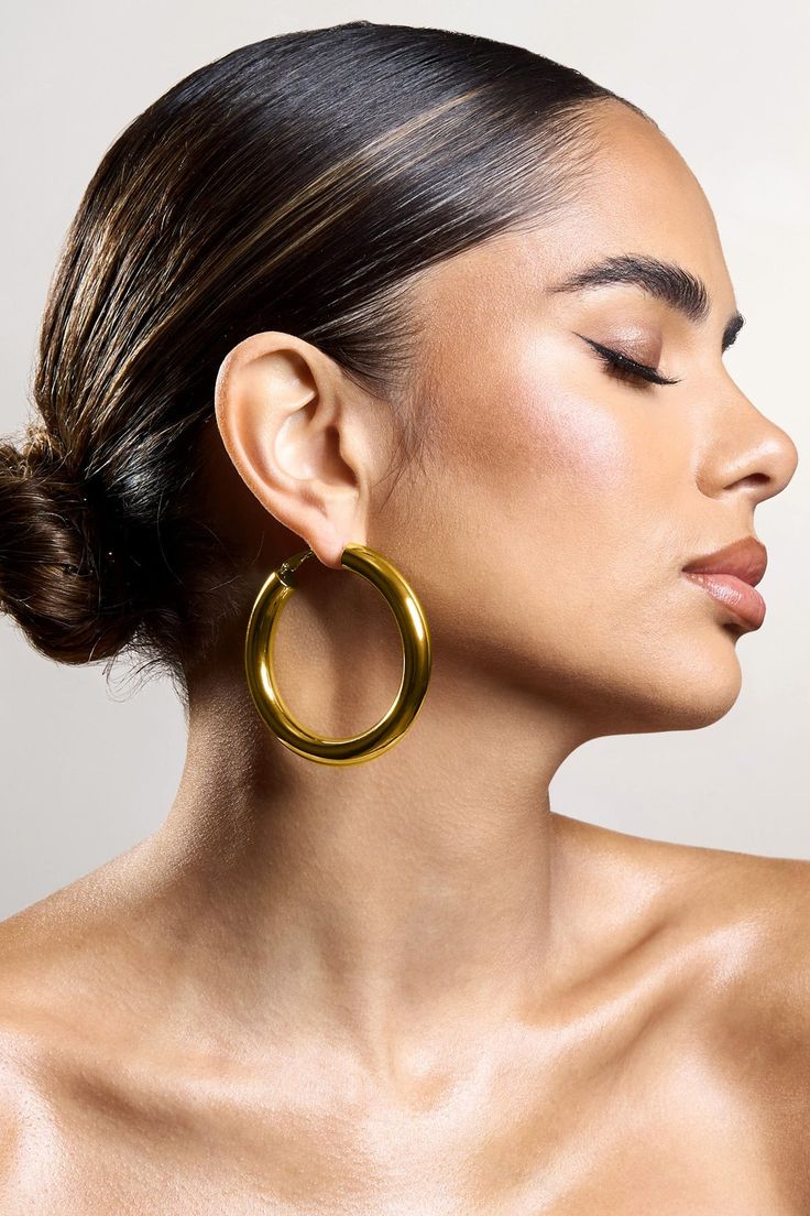 Elevate your daily ensemble with a pair of hoops like Logan. Arriving in a chunky yet lightweight design, these gold earrings are made to see you from day to night.Features - Gold toned - Chunky hoop design- Hinge fastening Product Information Designed exclusively by Club L London Gold-toned brass (100% Brass) SKU: CL134271007 Returns InformationEarrings and pierced jewellery cannot be returned for health and hygiene reasons. Health And Hygiene, Chunky Twists, Club L London, Sleek Bun, Statement Hoop Earrings, Abstract Earrings, Chunky Hoop Earrings, Chunky Earrings, Hoop Design