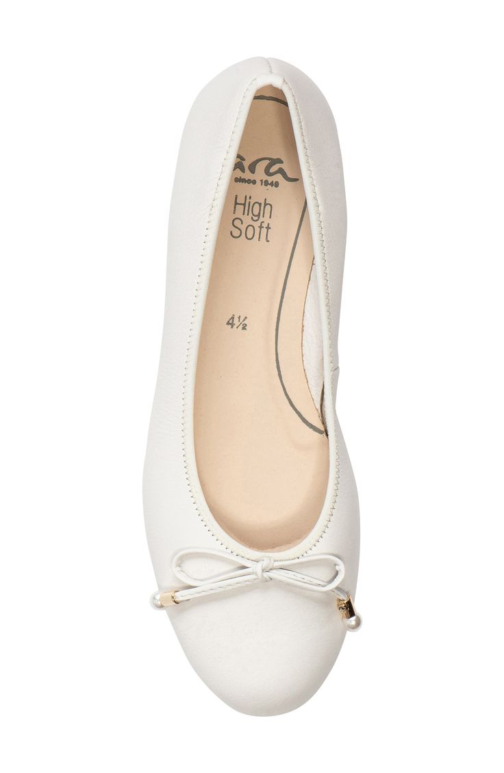 A slim bow tops the toe of an elegant ballet flat grounded by a barely there heel. Imitation-pearl size: 7.5–8mm Cushioned footbed with arch support Leather upper and lining/synthetic sole Imported Women's Shoes Formal White Ballet Flats With Removable Insole, Fitted White Ballet Flats, Elegant White Ballet Flats With Removable Insole, Elegant Synthetic Ballet Flats For Spring, Elegant Ballet Flats With Arch Support, Elegant White Ballet Flats, Elegant Flats With Arch Support And Round Toe, Elegant Closed Toe Flats With Arch Support, Elegant Fitted Ballet Flats With Removable Insole