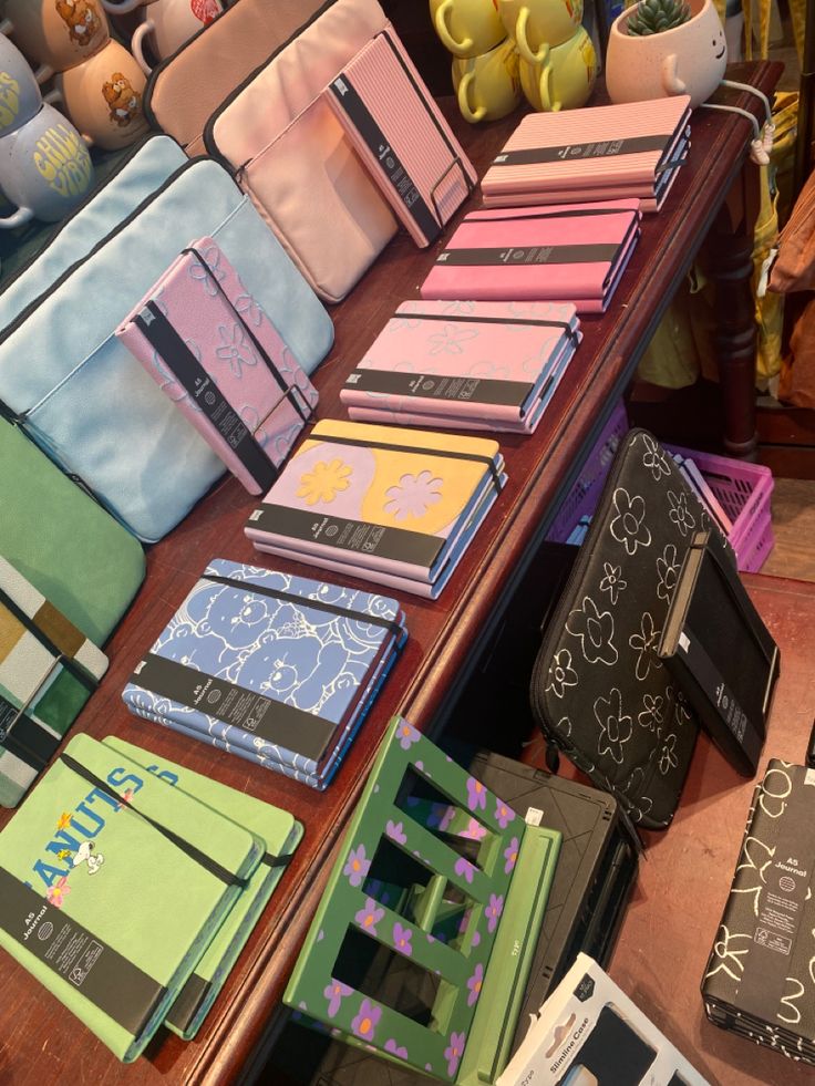 a table with many different colored cases on it