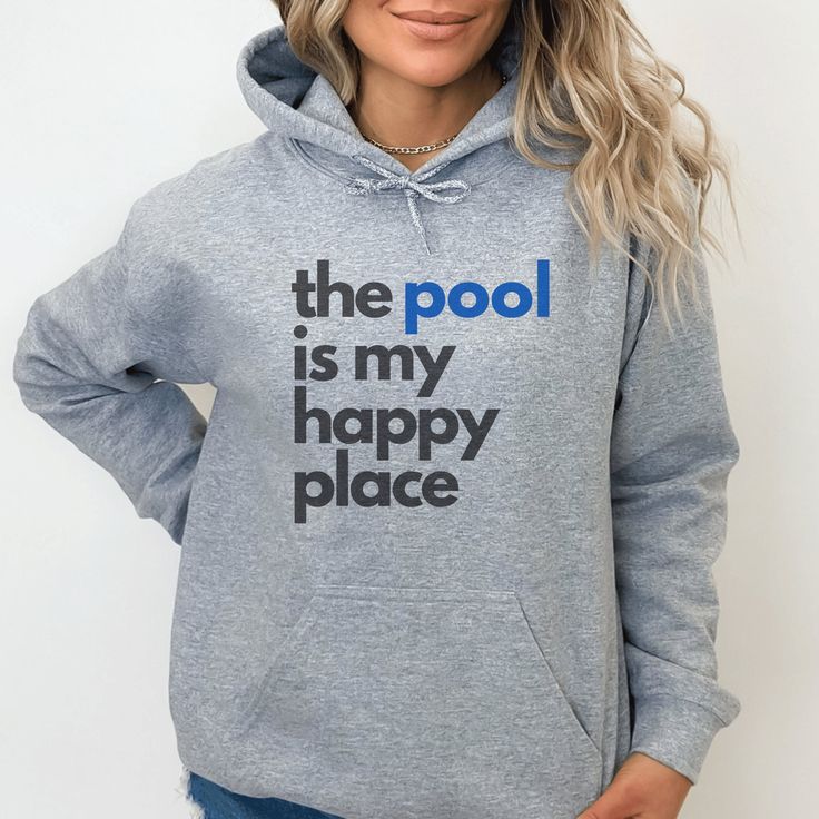 The Pool is My Happy Place oversized hoodie sweatshirt.  So cozy, comfortable & cool. Celebrate your love of swim in this oversized, unisex, fuzzy, fleece sweatshirt. Straight out of the pool this unisex, heavy blend hooded sweatshirt is relaxation itself. Made with a thick blend of cotton and polyester, it feels plush, soft and warm, a perfect choice for any cold day. In the front, the spacious kangaroo pocket adds daily practicality while the hood's drawstring is the same color as the base sweater for extra style points.  Perfect for all the swimmers - comp swimmers, rec swimmers, college swimmers. Great swimming gift for swimmer or swim coach. Great for summer swimmers or year-round swimmers. 50% cotton, 50% polyester Medium-heavy fabric (8.0 oz/yd² (271 g/m Classic unisex fit. Order on Swim Slogans, Swimming Slogans, Swim Shirts Swimmers, Swim Team Pictures, Swim Hoodie Designs, Swimming Memes, Pool Swimming, Swim Mom, Gifts For Swimmers