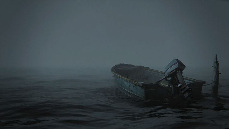 a boat floating on top of a body of water in the middle of dark fog