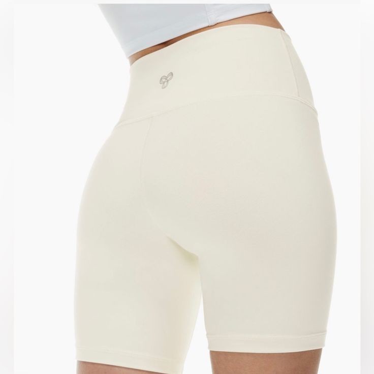 Size Medium New With Tags Tna 7” Shorts In A Creamy White Color Super Buttery Soft White Compression Biker Shorts With Built-in Shorts, White Bottoms With Built-in Shorts, White Sports Shorts With Short Inseam, White Stretch Athletic Shorts, Stretch White Athletic Shorts, White Stretch Athletic Shorts With Short Inseam, White Short Athleisure Bottoms, White Short-length Athleisure Bottoms, White Short Length Athleisure Bottoms