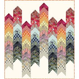 an image of a quilt pattern with many different shapes and sizes on it, including the top half