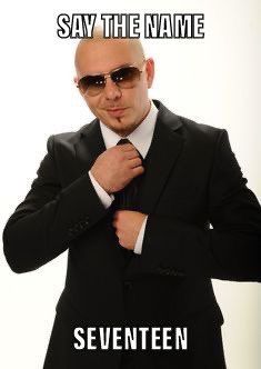 a man in a suit and sunglasses adjusting his tie with the caption say the name