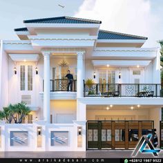 a white two story house with balconyes and balconies on the second floor