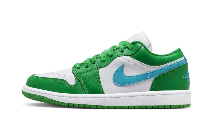 The Women’s Air Jordan 1 Low “Lucky Green” is a colorful, spring-ready look for the classic low-top sneaker designed in women’s sizing.  The shoe features a white leather base with Lucky Green overlays.  A bright Aquatone blue leather Swoosh logo appears on each side of the shoe and “Wings” branding is embroidered on the heel.  A blue Jumpman appears on the tongue.  Release date: April 11, 2023 Jordan Lows, Nike Jordan 1 Low, Jordan Ones, Jordan Sneaker, Nike Air Jordan 1 Low, Jumpman Logo, Jordan Outfits, Jordan Air, Lucky Green