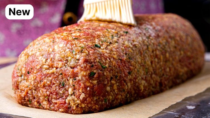 a close up of a piece of food with a brush in it