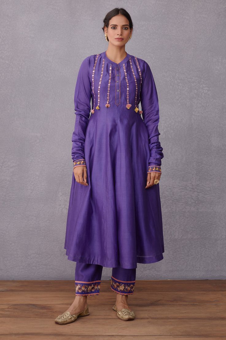 Editor's Note Featuring Purple Jamuni Sitara Raisah Kurta With Pants Color: Purple Fabric: Handwoven Chanderi, Pure Cotton Silk Components: Kurta and pant Care: Dry Clean Only    About the Desi... Indian Mythology, Indian Textiles, Sharara Set, Gathered Sleeves, How To Hem Pants, Embroidered Neckline, Indian Fashion Designers, Kurta With Pants, Purple Fabric