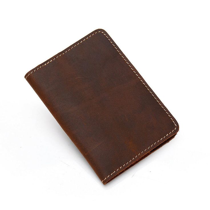 Start an international adventure with our new Priam Handmade Leather Passport Cover. The cover is made using full-grain crazy horse leather. This distressed leather is beautiful and will develop an amazing patina over time.  The Priam Handmade Leather Passport Cover is a great way to protect your passport. It has been designed with the help of our professional designers in order to provide you with an elegant yet practical solution for your travel documents. The design features two compartments Going Abroad, Travel Documents, Money Pouch, Leather Passport Holder, Passport Case, Leather Passport Cover, La Fashion, Passport Cover, Crazy Horse