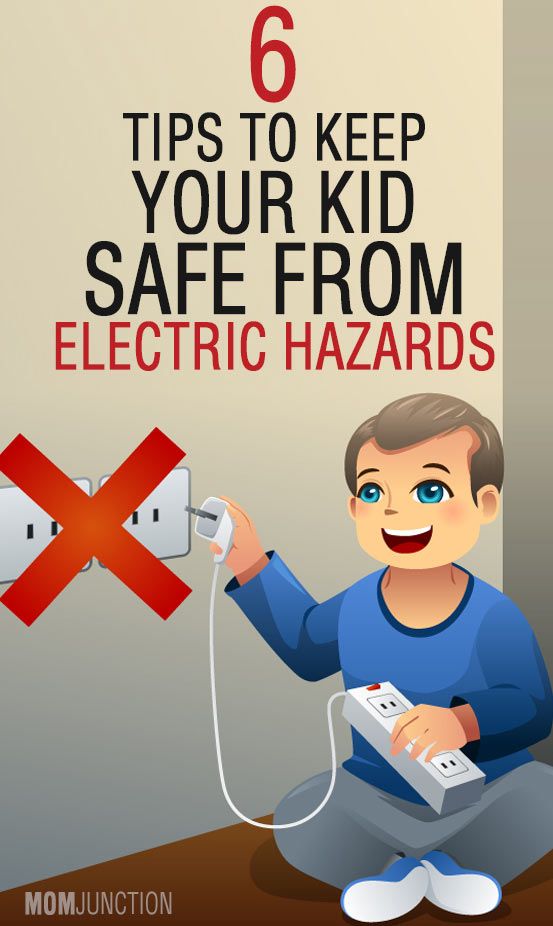 a man sitting on the ground with an electric hazard sign in front of him that says 6 tips to keep your kid safe from electric hazard