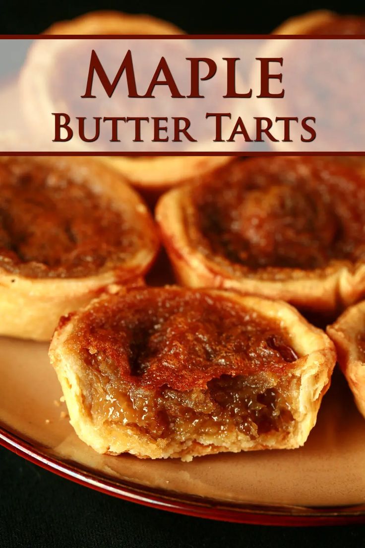 several small pies on a plate with the words maple butter tarts