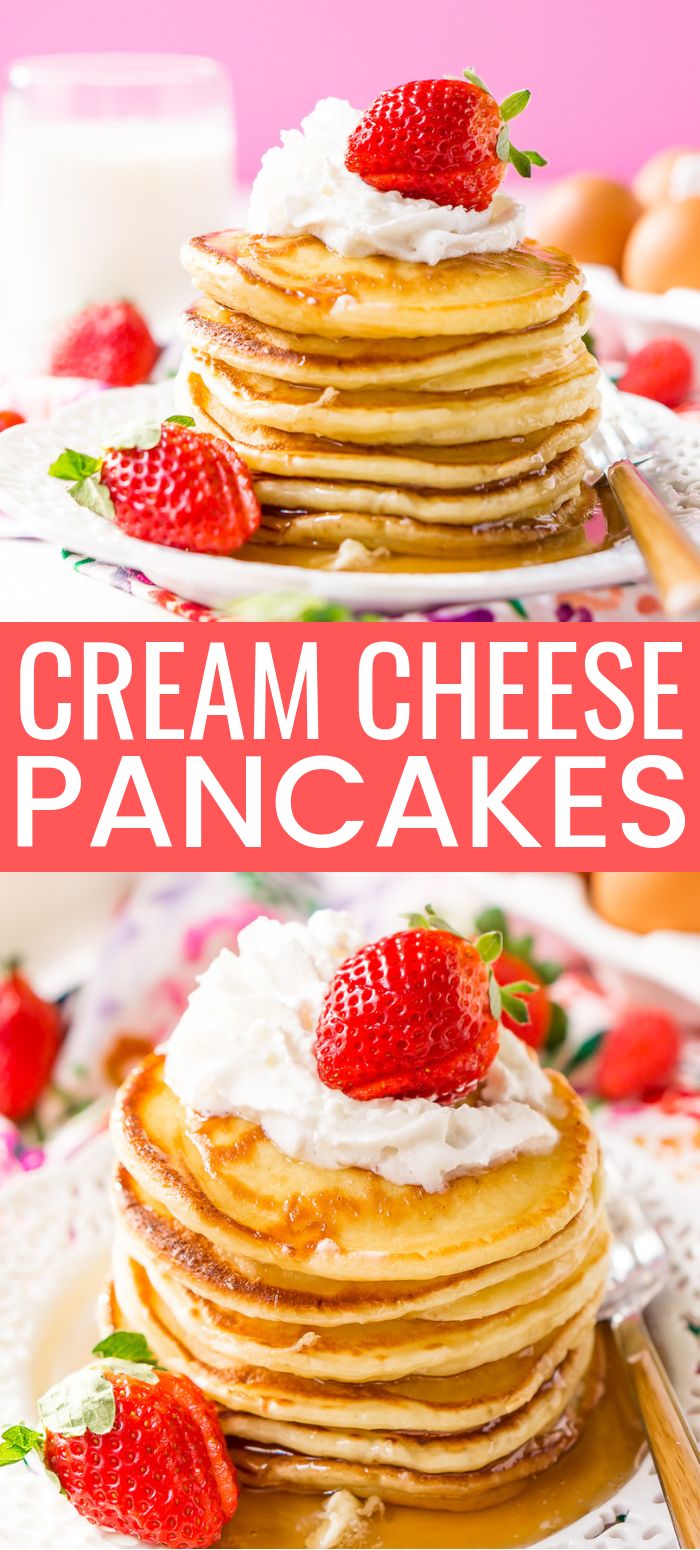 a stack of pancakes topped with whipped cream and strawberries