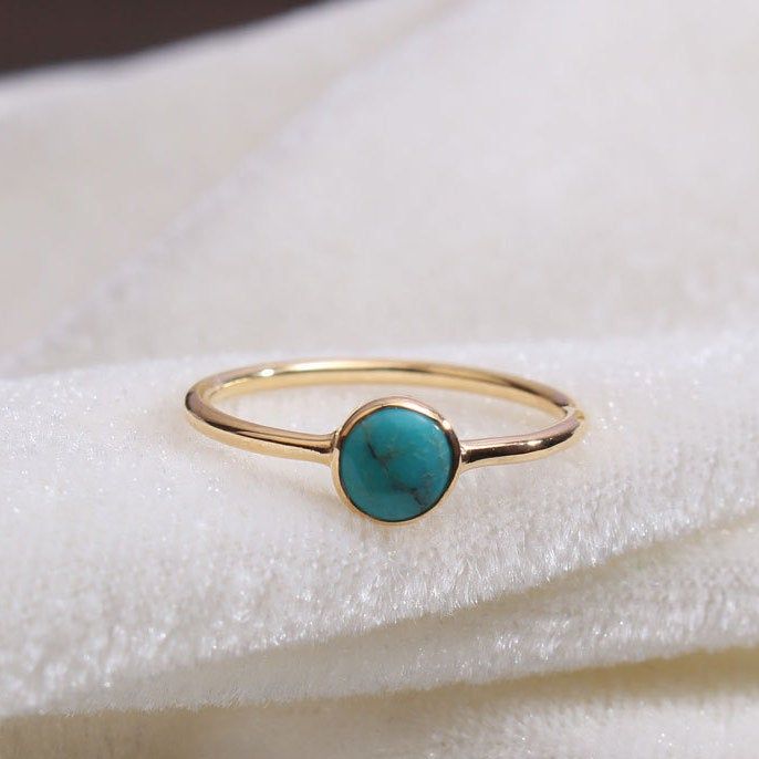 "Materials Gold, Rose gold, White gold Gemstone: turquoise Turquoise Ring / Round Cut Turquoise Ring In 14k Gold / Stackable Turquoise Ring / Natural Turquoise / December Birthstone Ring / Fine Ring Item Features * Made to Order. * Gold KT: 14K * Custom Gold Color: Rose Gold, Yellow Gold, White Gold * Gemstone Cut: Round * Number of Stones: 1 * Stone Size: 4 mm * Setting Type: Bezel * Band Width: 1.25mm * Ring is marked gold Marked * ready to Ship in 7-10 Business Days * Also available in other Gold Turquoise Ring With Gemstone, Gold Turquoise Ring For Anniversary, Gold Turquoise Ring Fine Jewelry, Dainty Gold Turquoise Gemstone Ring, Dainty Gold Turquoise Ring, Gold Turquoise Ring Gift, Gold Turquoise Ring For Gift, Gold Turquoise Ring With Bezel Setting As Gift, Gold Turquoise Ring With Bezel Setting For Gift