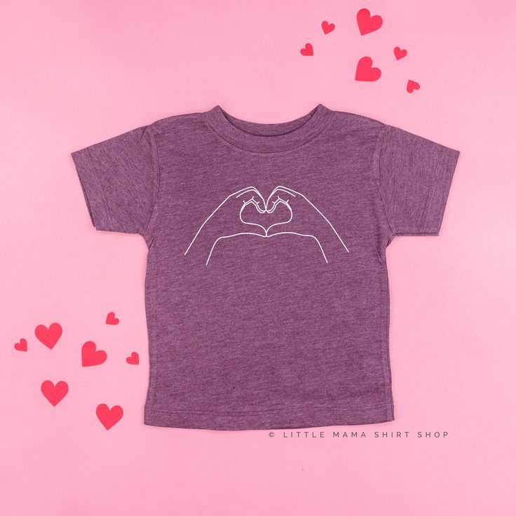 All Little Mama shirts are unisex sizing. Please reference size charts before purchasing. Short Sleeve Top With Heart Graphic, Stretch Short Sleeve Tops With Heart Graphic, Stretch Top With Heart Graphic And Short Sleeves, Unisex Short Sleeve Tops With Screen Print, Cute Fitted Purple T-shirt, Fitted Cotton Tops For Family Matching, Unisex Basic Shirt With Letter Print, Basic Unisex Crew Neck Shirt, Stretch Graphic Tee Shirt With Graphic Print