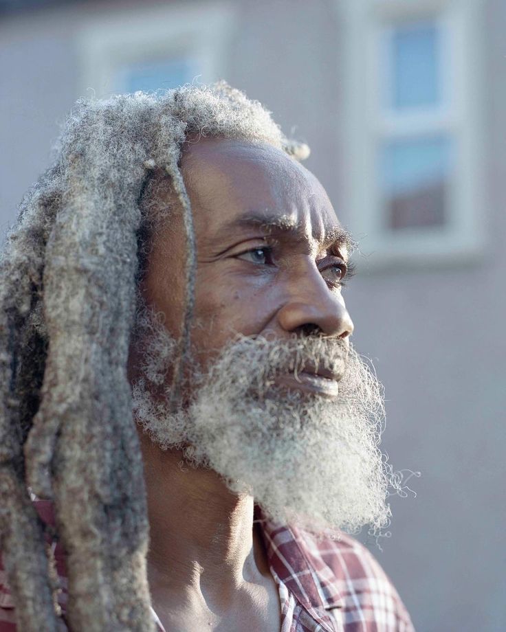 a man with long grey hair and white beard