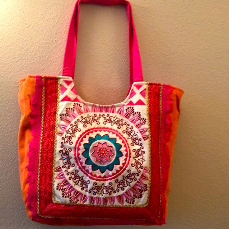 Colorful Handwoven Tote Bag From India With Beautiful Mandala Pattern. Has Two Inside Pockets With Zipper. This Is Brand New With Tags. Great For The Beach, Carry On Or A Pic Nic. Approx. 17x15 Inches. Pink Bohemian Bag For Daily Use, Pink Embroidered Beach Bag, Summer Pink Embroidered Bags, Pink Embroidered Bags For Everyday Use, Trendy Pink Embroidered Bag, Bohemian Pink Bag For Summer, Pink Embroidered Shoulder Bag For Shopping, Bohemian Pink Bags For Summer, Pink Embroidered Shoulder Bag