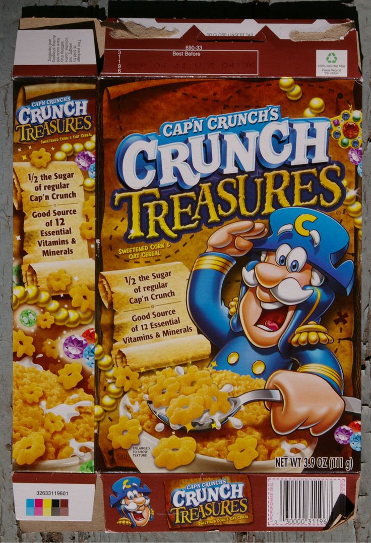 crunch treasures cereal box sitting on the ground