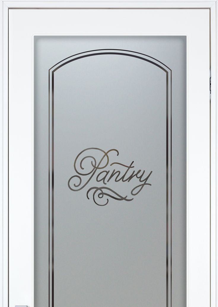 a white door with the word pantry on it's side and an ornate frame