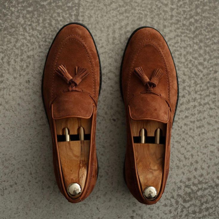 Elegant brown loafers with tassels made of genuine suede🤎 ⠀  Emphasize your style with loafers made of high quality genuine suede. These classic brown tasseled shoes will be the perfect addition to your wardrobe, adding charm and elegance to any look.  Soft suede and a comfortable outsole will provide comfort all day long. Luxury Italian Tassel Loafers For Semi-formal Occasions, Elegant Luxury Tassel Loafers, Luxury Elegant Closed Toe Tassel Loafers, Luxury Leather Tassel Loafers With Brogue Detailing, Luxury Elegant Cap Toe Tassel Loafers, Luxury Timeless Tassel Loafers With Leather Lining, Luxury Classic Calf Leather Tassel Loafers, Luxury Tassel Loafers With Brogue Detailing For Work, Luxury Classic Closed Toe Tassel Loafers