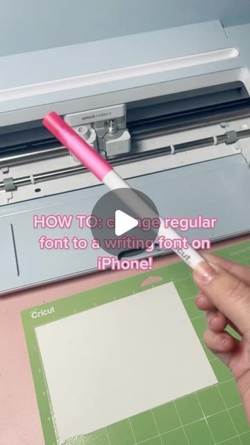 someone is using a cricut machine to cut paper on a piece of paper