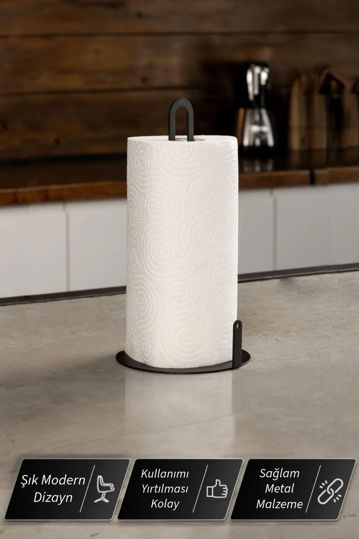 a roll of toilet paper sitting on top of a counter