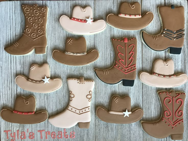 decorated cookies in the shape of cowboy boots and boots