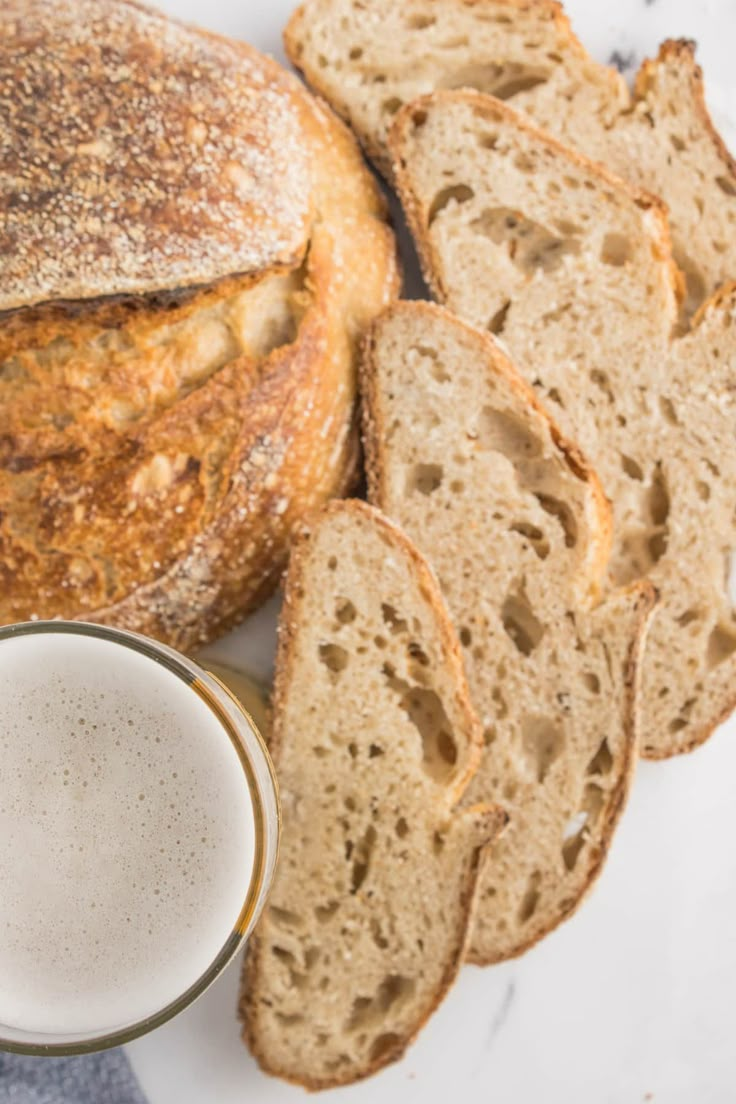 some bread and a glass of milk on a table