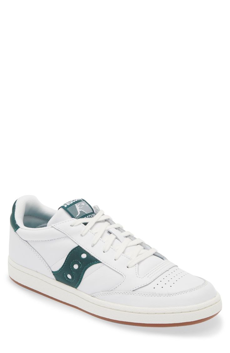 Whatever hard surface you're playing on, this iconic sneaker is updated with a classic cupsole, lightweight midsole and perforations to keep you comfortable. Leather upper/textile lining/synthetic sole Imported Classic Skate Shoes With Perforations And White Sole, Classic Low-top Skate Shoes With Perforations, Classic Green Sneakers With Perforated Toe Box, Classic High-top Skate Shoes With Perforations, Casual Lace-up Basketball Shoes With Perforations, Casual Basketball Shoes With Speckled Midsole, Classic High-top Skate Shoes With Perforated Toe Box, White Sole Mid-top Skate Shoes With Perforations, Casual High-top Basketball Shoes With Perforations