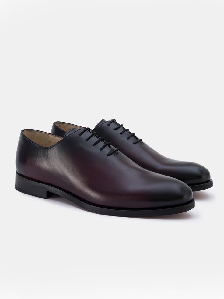 Color: bordeaux Caw leather with natural finish Leather insoles Rubber and leather soles Traditional lace-up closure Hand-stitched detailing Burgundy Brogue Oxfords With Plain Toe, Burgundy Oxfords With Brogue Detailing And Plain Toe, Classic Burgundy Oxfords With Plain Toe, Classic Burgundy Oxfords With Brogue Detailing, Burgundy Wingtip Oxfords With Leather Sole, Burgundy Wingtip Dress Shoes With Leather Sole, Classic Burgundy Wingtip Oxfords, Classic Burgundy Dress Shoes For Galas, Burgundy Wingtip Oxfords With Rubber Sole